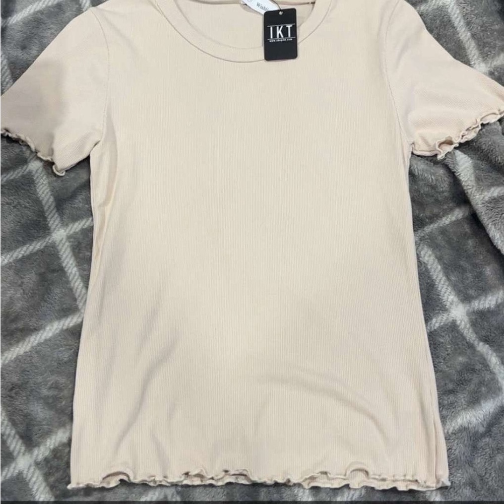 BRAND NEW WITH TAGS! Women's Cream Ruffle Hem Top